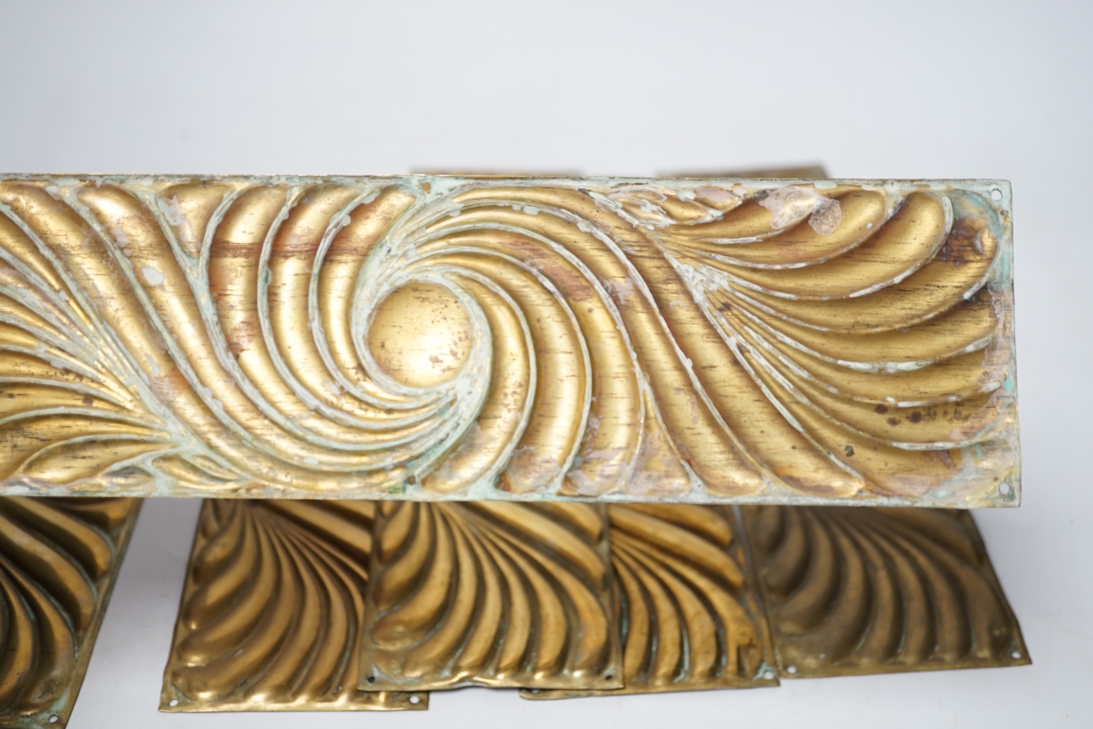 A set of brass embossed door plates, Art Nouveau style, 28 x 8cm. Condition - fair to good